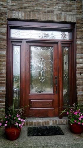 Therma-Tru Classic Craft stained with transom above. Oil rubbed bronze hardware, door, door installation, carmel, fishers, Indianapolis, Indiana, entry doors, front doors